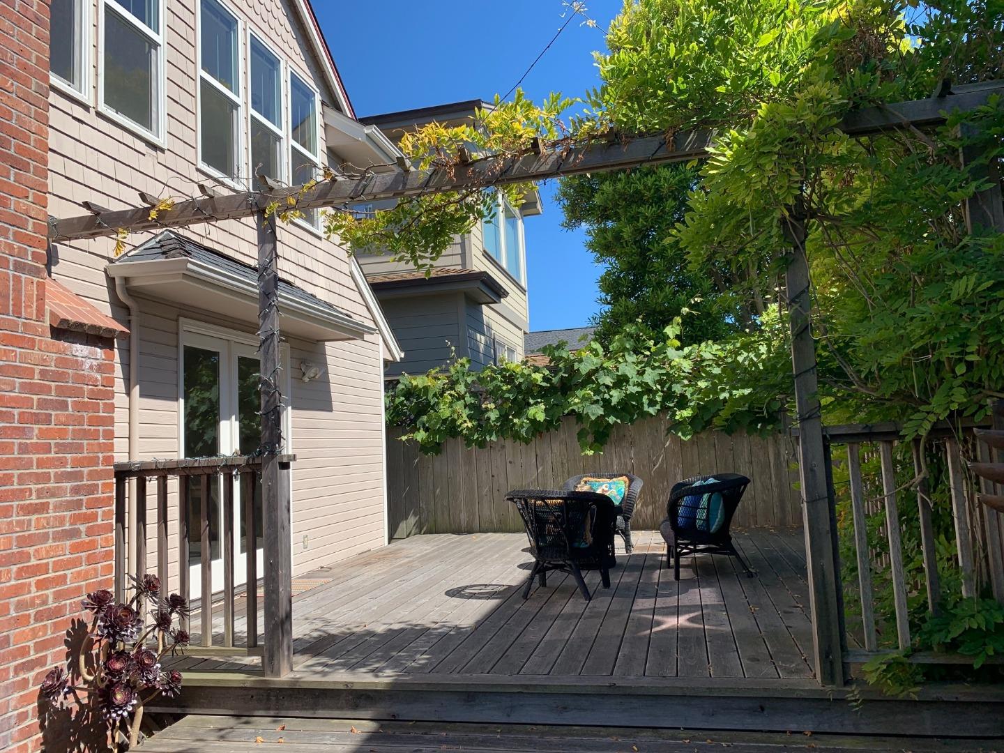 111 Fairview Avenue Capitola, CA 95010 - Photo 29 of 29 a view of backyard with a table and chair