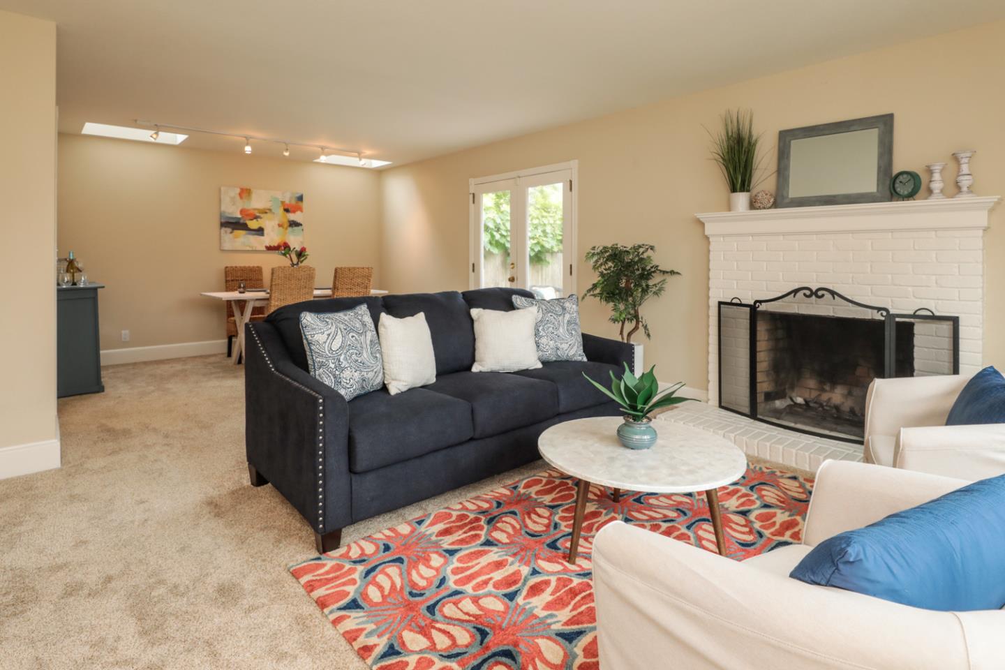 111 Fairview Avenue Capitola, CA 95010 - Photo 3 of 29 a living room with furniture and a fireplace
