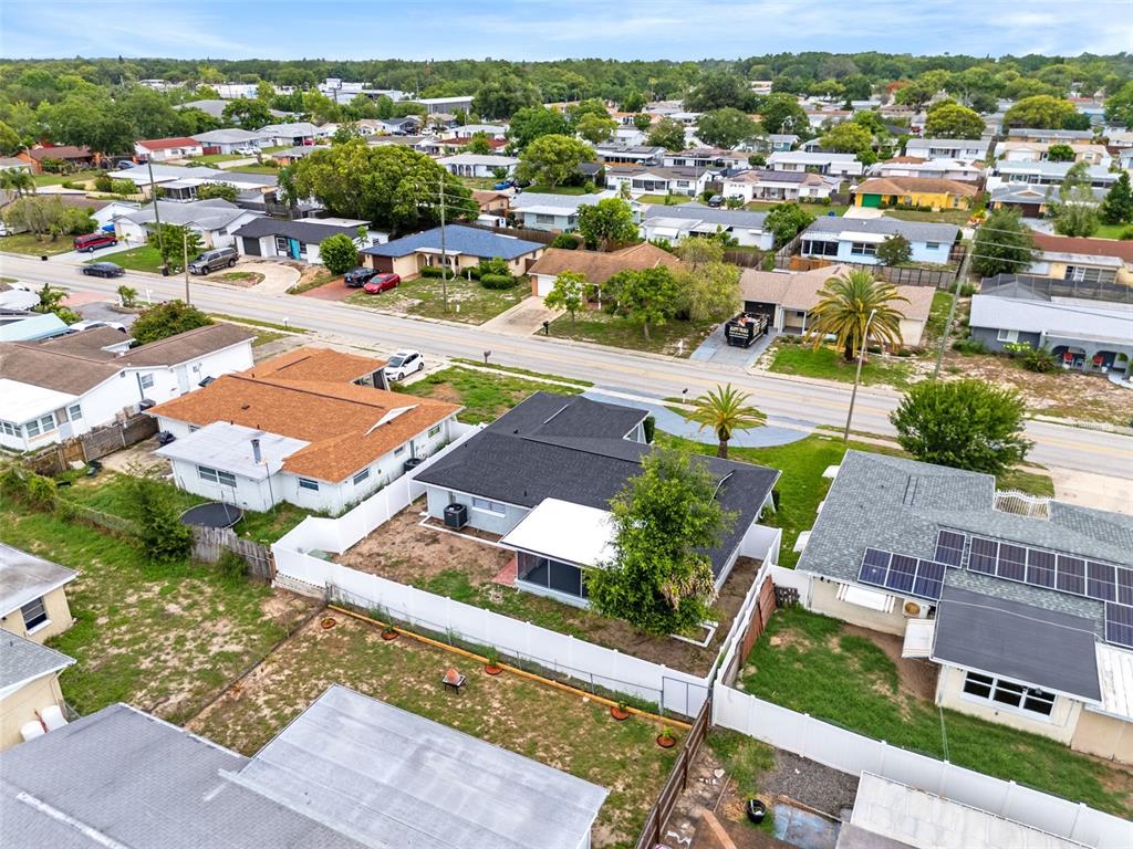 5626 Moog Road Holiday, FL 34690 - Photo 37 of 38 an aerial view of residential houses with city view