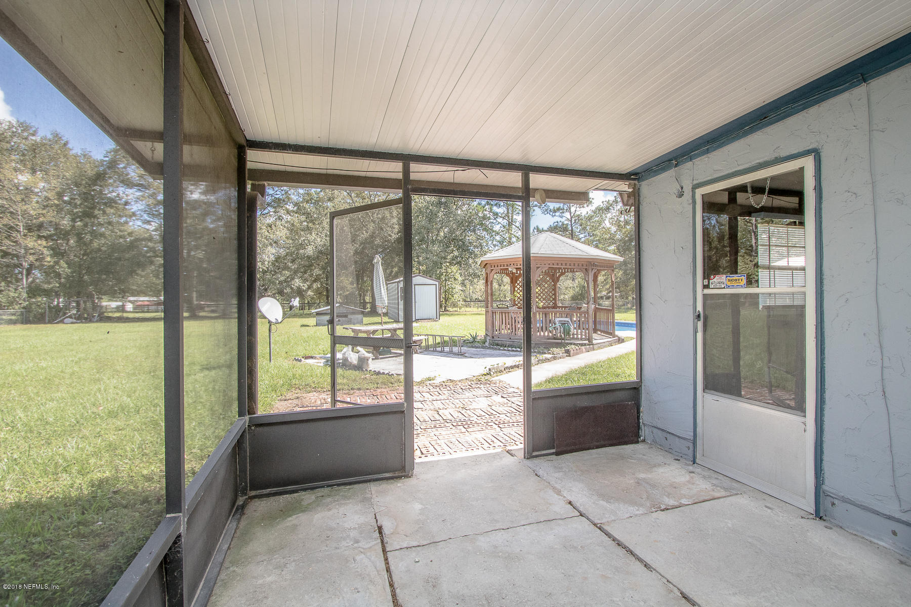 1595 Nolan Road Middleburg, FL 32068 - Photo 23 of 29 Enclosed Patio View 2