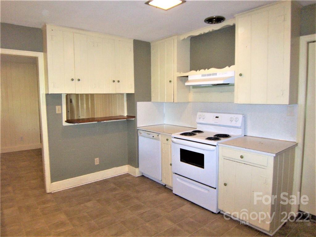 4529 Fallston Road Lawndale, NC 28090 - Photo 12 of 38 a kitchen with a stove and a sink