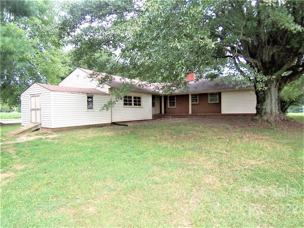 4529 Fallston Road Lawndale, NC 28090 - Photo 28 of 38 a view of a house with a backyard