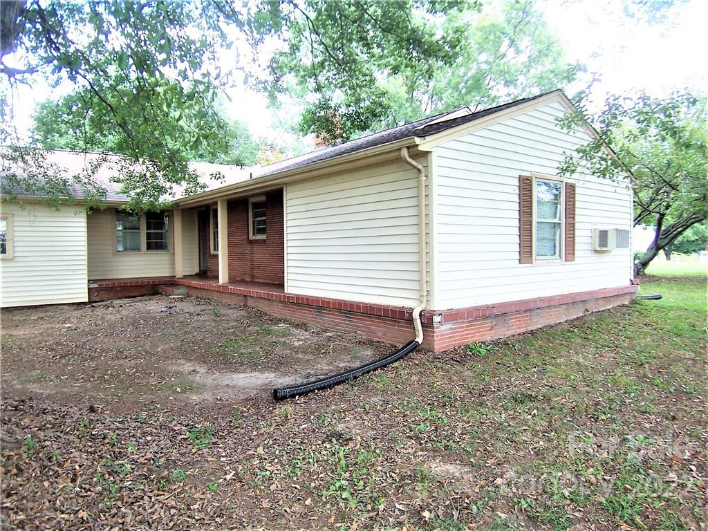 4529 Fallston Road Lawndale, NC 28090 - Photo 29 of 38 a view of a house with a yard and garage