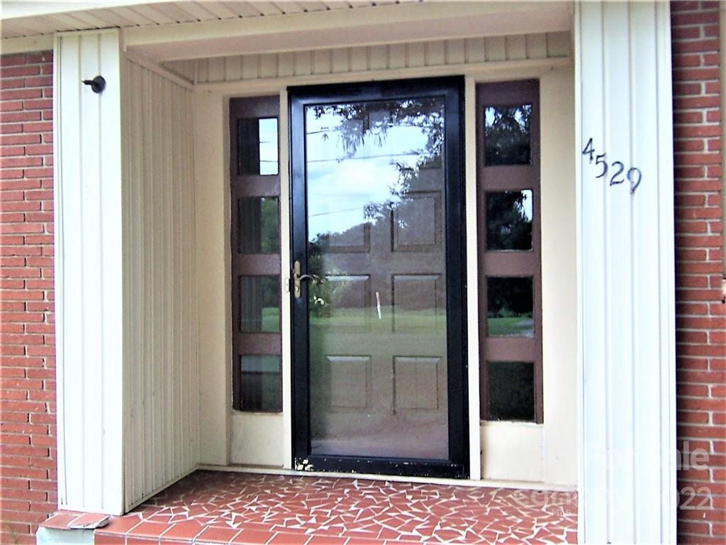 4529 Fallston Road Lawndale, NC 28090 - Photo 4 of 38 a view of a glass door