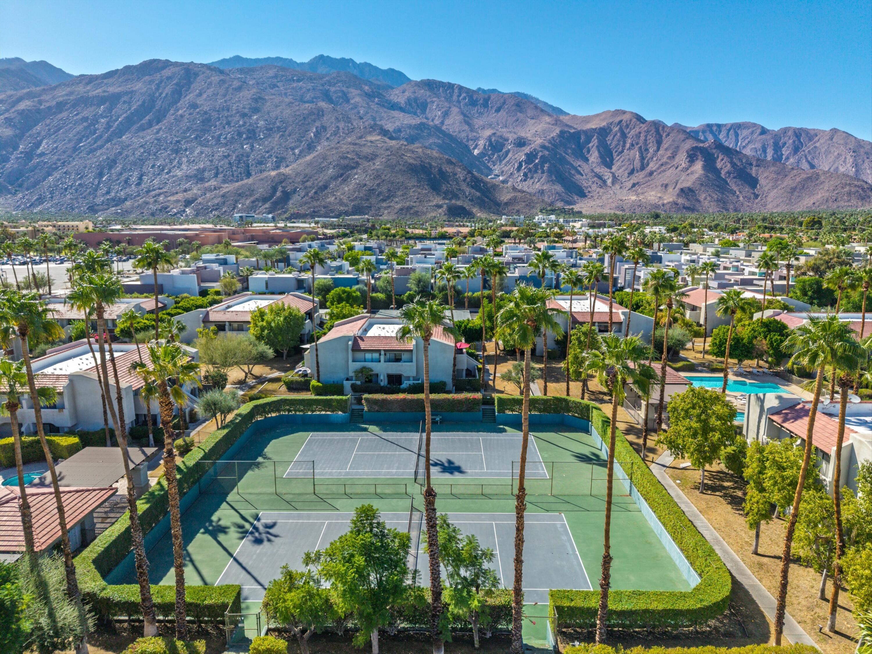 1100 East Amado Road, Unit 15D1 Palm Springs, CA 92262 - Photo 17 of 19 Aerial tennis court