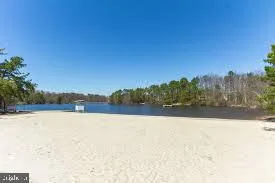 a view of swimming pool and mountain in the back