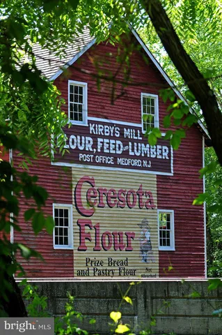 a sign that is on the wall of building