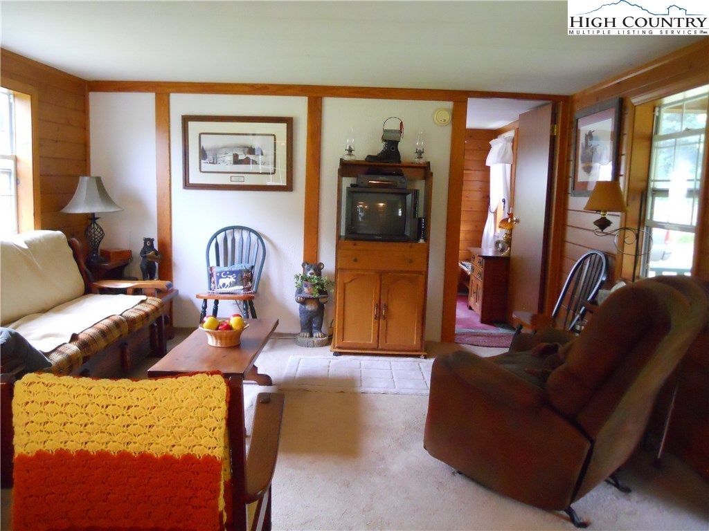 3264 Whenlin Ridge Road Lansing, NC 28643 - Photo 3 of 15 a living room with furniture and large window