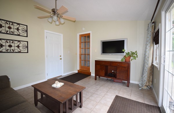 175 Tinkham Road Springfield, MA 01129 - Photo 13 of 30 a living room with furniture and a flat screen tv