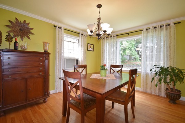 175 Tinkham Road Springfield, MA 01129 - Photo 8 of 30 a view of a dining room with furniture window and wooden floor