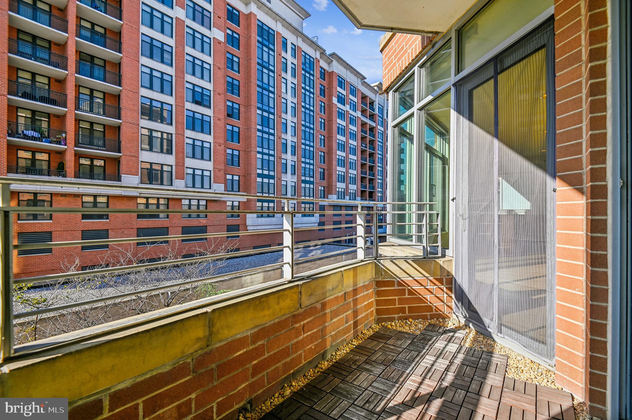 1400 Lancaster Street, Unit 502 Baltimore, MD 21231 - Photo 23 of 48 a view of swimming pool with a lounge chairs