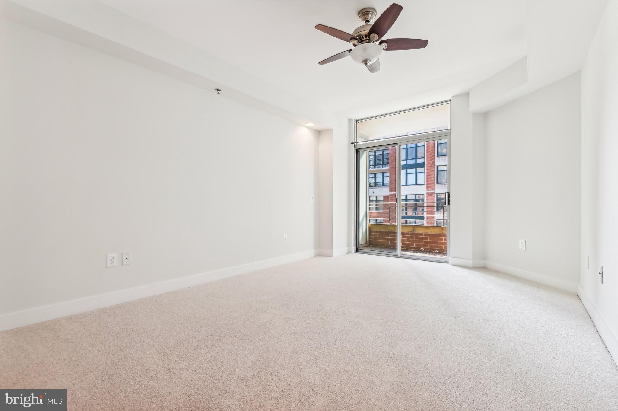 1400 Lancaster Street, Unit 502 Baltimore, MD 21231 - Photo 27 of 48 a view of an empty room with a window