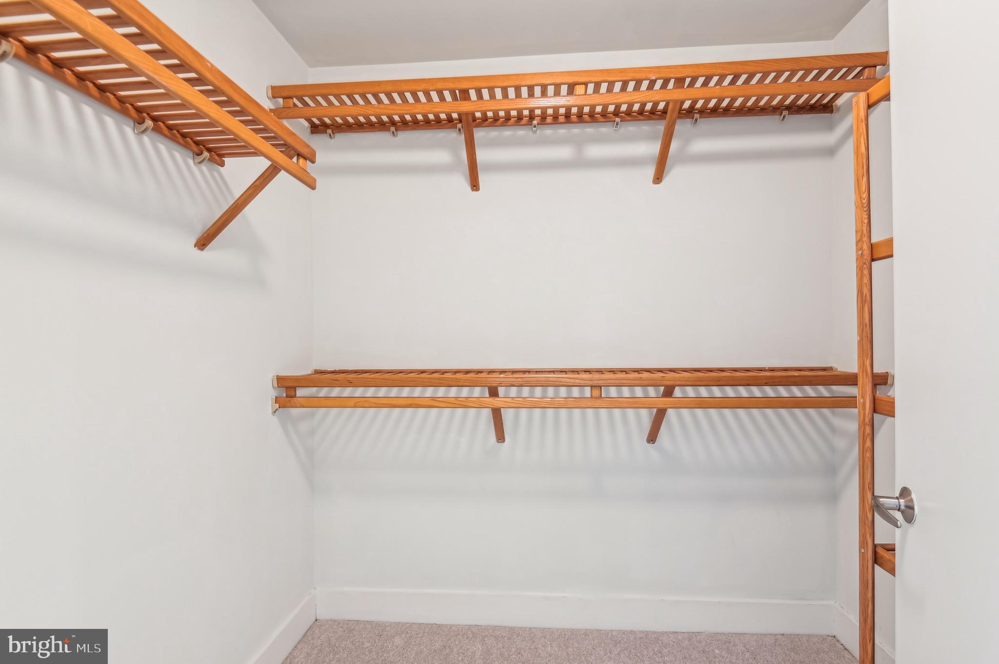 1400 Lancaster Street, Unit 502 Baltimore, MD 21231 - Photo 35 of 48 a view of a room with racks on the wall