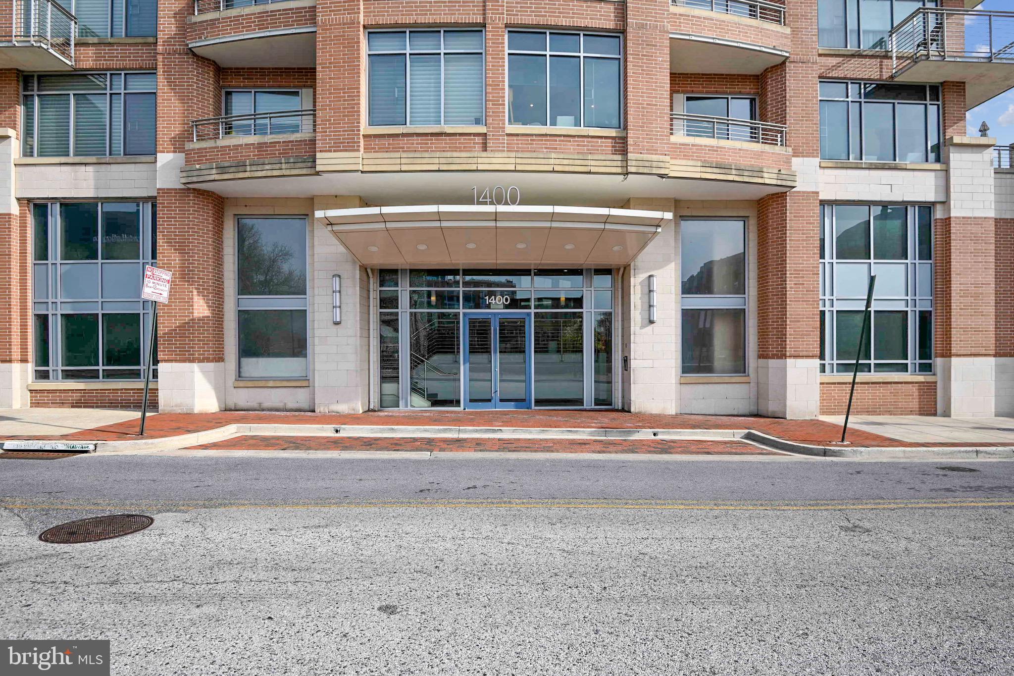 1400 Lancaster Street, Unit 502 Baltimore, MD 21231 - Photo 45 of 48 front view of an buildings with a parking space