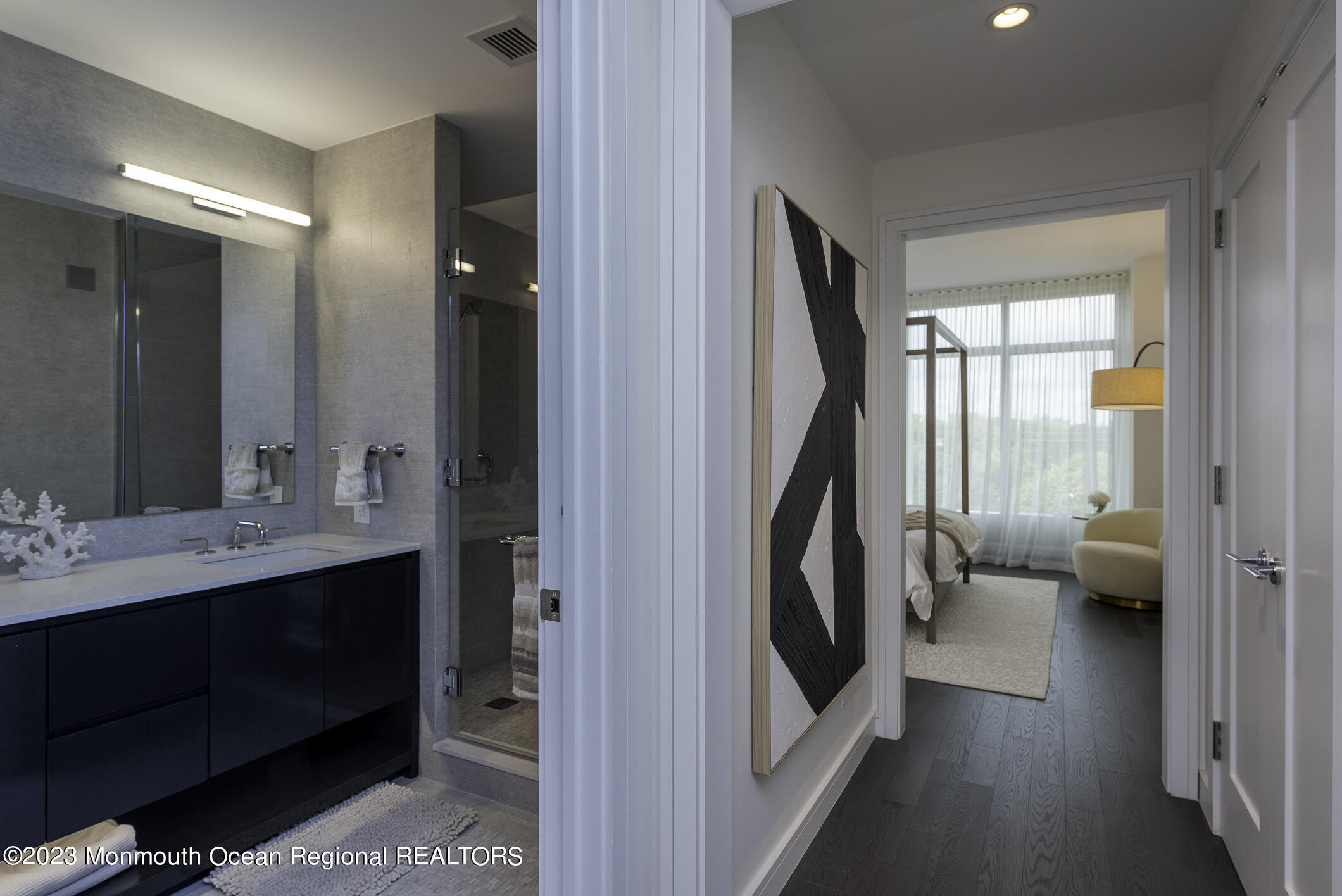 30 Melrose Terrace, Unit 301(WINTER RENTAL) Long Branch, NJ 07740 - Photo 12 of 37 a en suite bathroom with a double vanity sink and a mirror