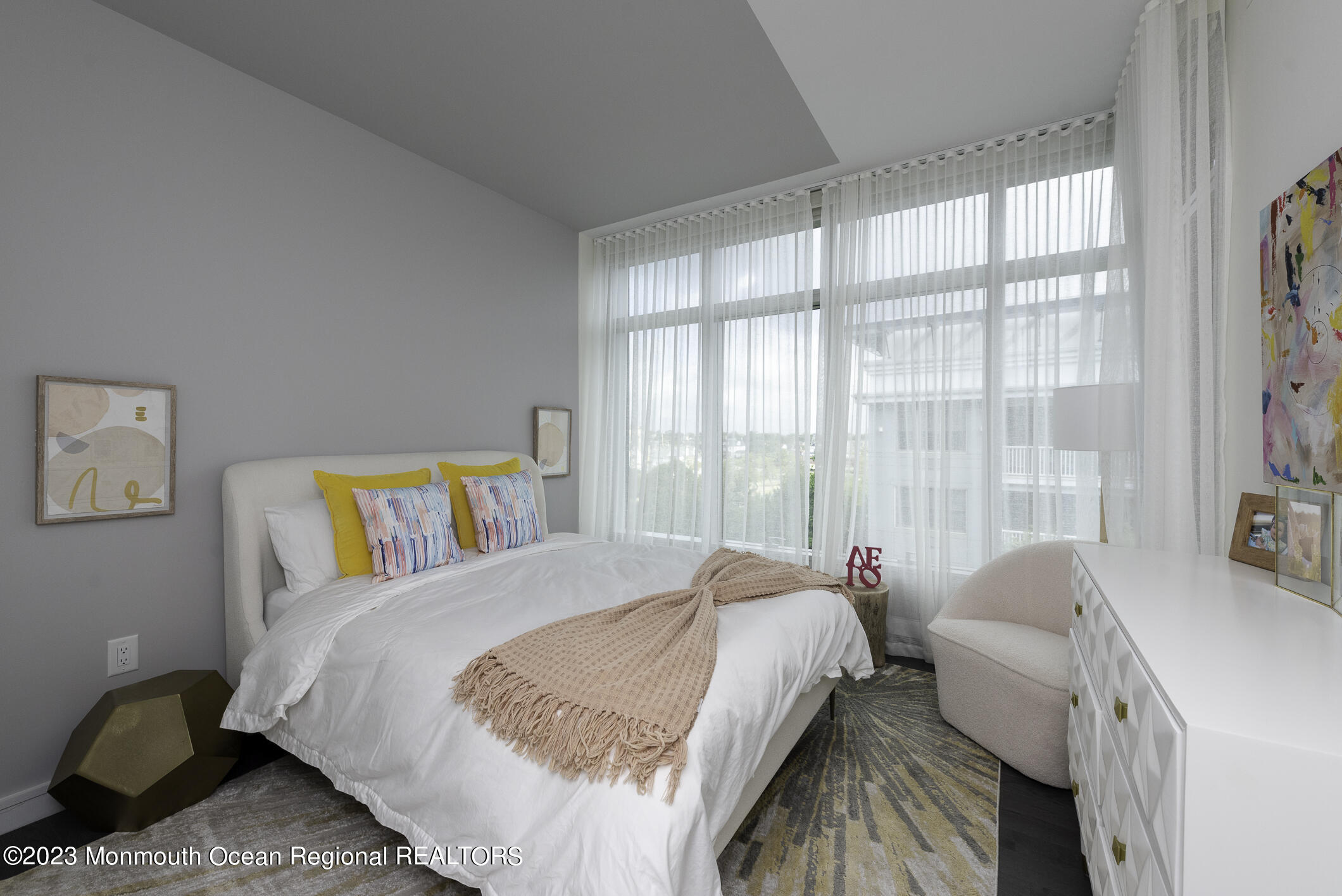 30 Melrose Terrace, Unit 301(WINTER RENTAL) Long Branch, NJ 07740 - Photo 16 of 37 a bed sitting in a bedroom next to a window