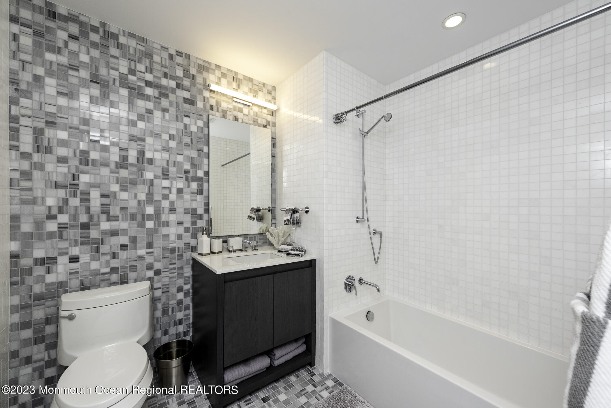 30 Melrose Terrace, Unit 301(WINTER RENTAL) Long Branch, NJ 07740 - Photo 17 of 37 a bathroom with a sink toilet and shower