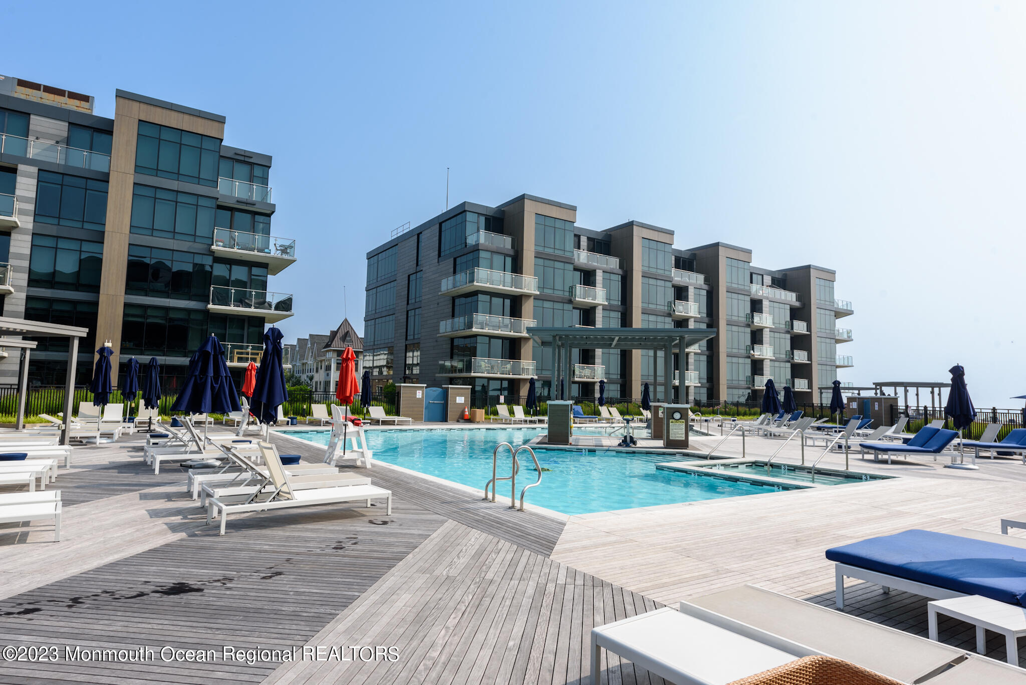 30 Melrose Terrace, Unit 301(WINTER RENTAL) Long Branch, NJ 07740 - Photo 23 of 37 a tall building sitting on top of a street