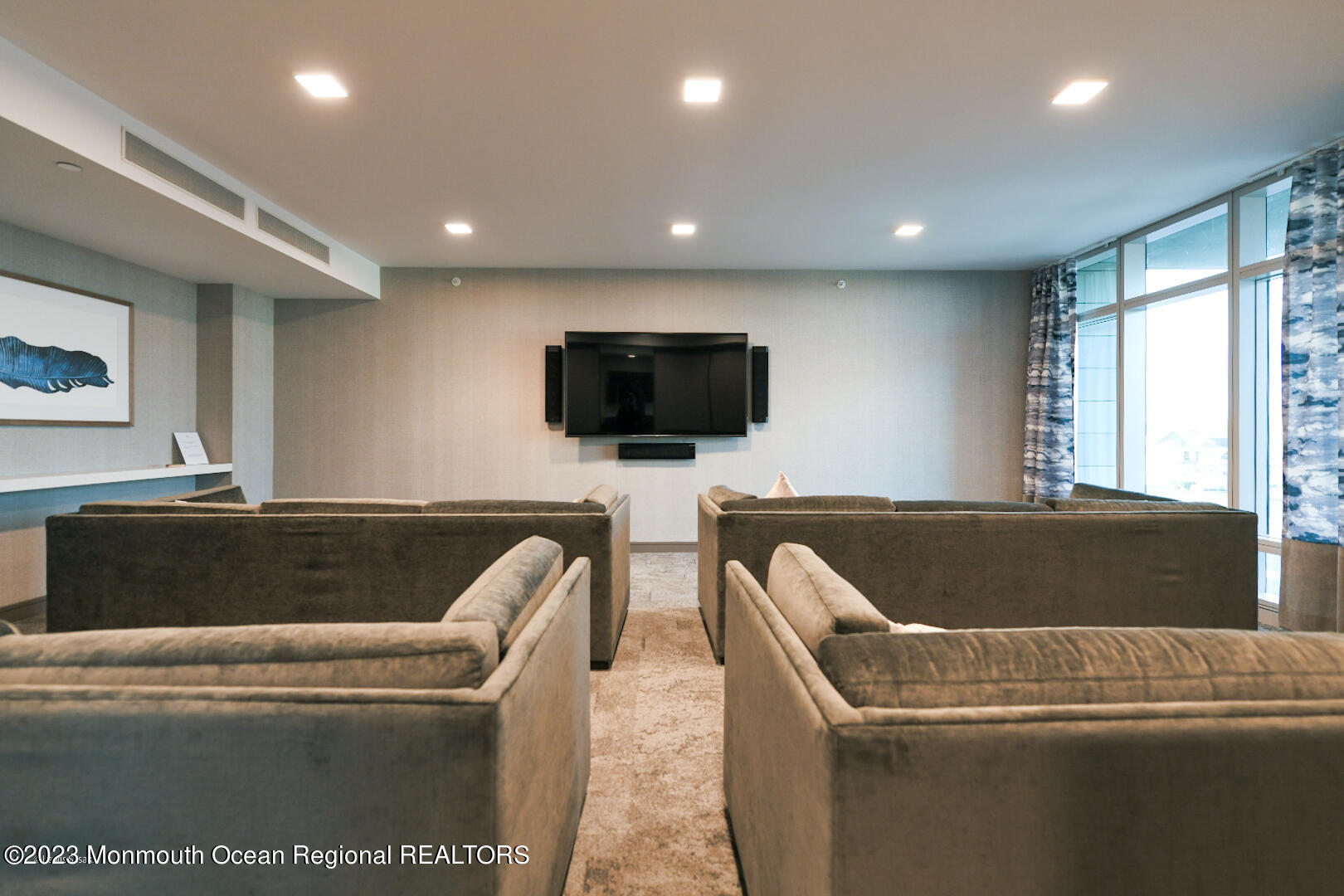 30 Melrose Terrace, Unit 301(WINTER RENTAL) Long Branch, NJ 07740 - Photo 35 of 37 a living room with a flat screen tv and a couch
