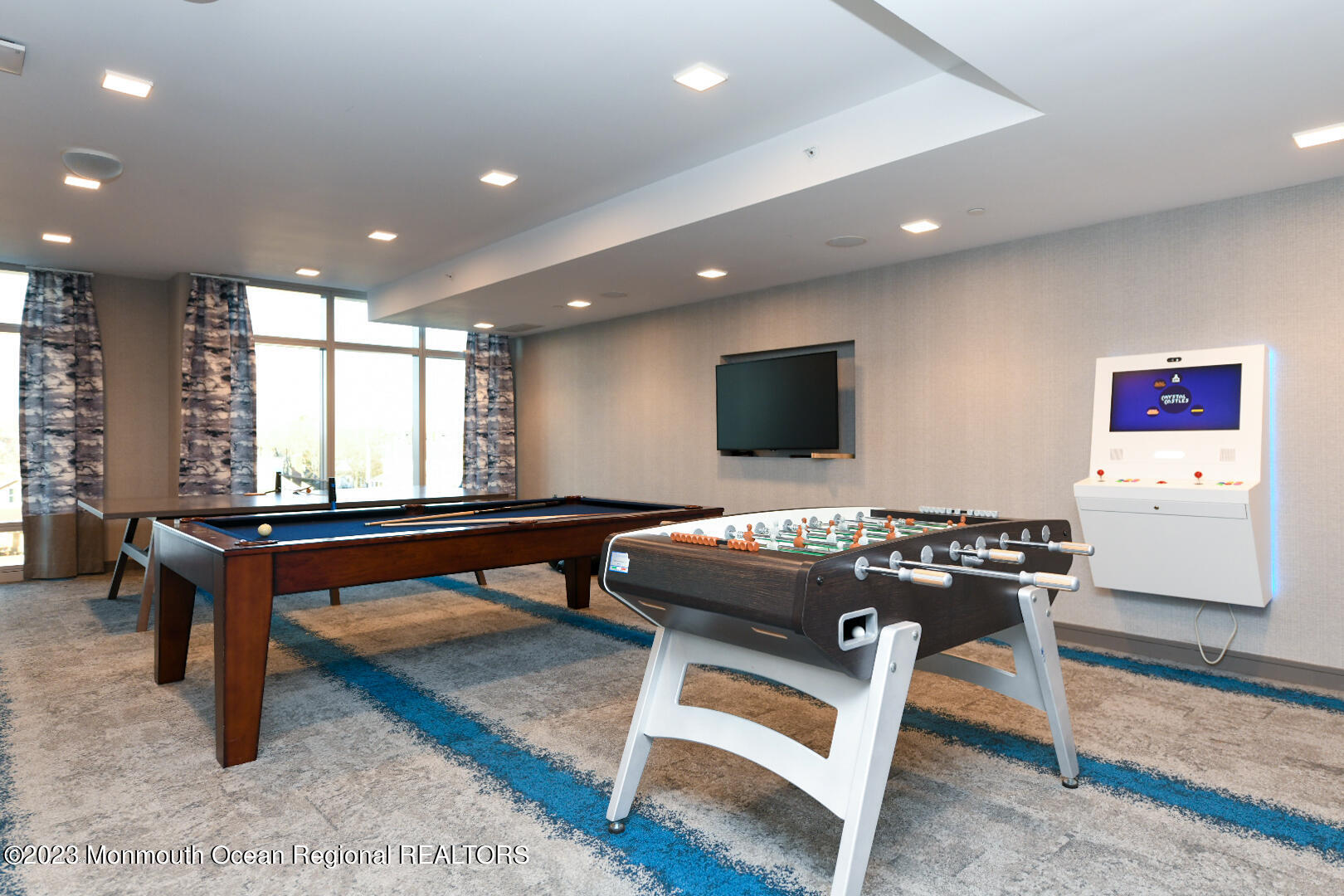 30 Melrose Terrace, Unit 301(WINTER RENTAL) Long Branch, NJ 07740 - Photo 36 of 37 a living room with furniture pool table and a flat screen tv
