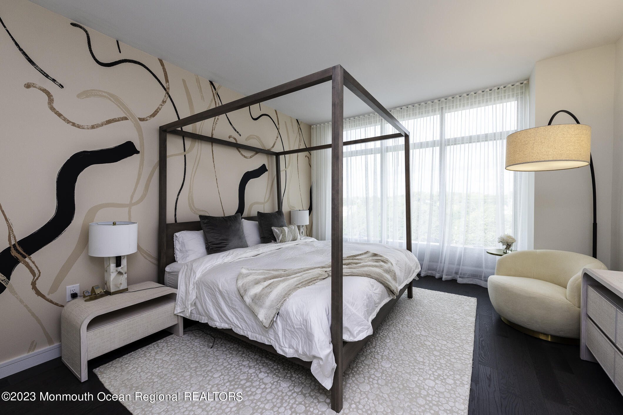 30 Melrose Terrace, Unit 301(WINTER RENTAL) Long Branch, NJ 07740 - Photo 9 of 37 a bedroom with bed and a chandelier