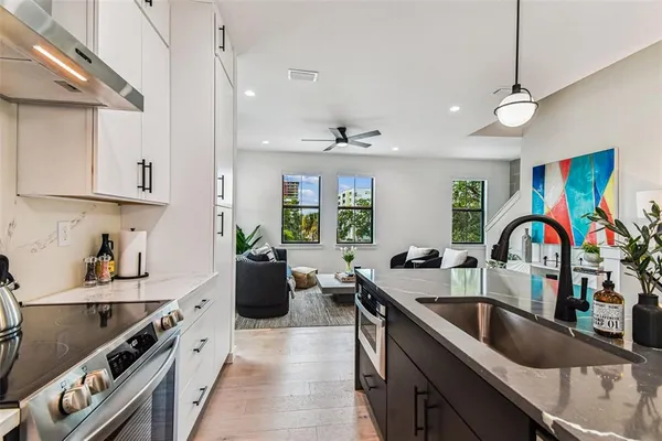a view of a hallway with washer and dryer