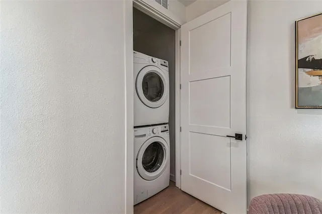 a bathroom with a shower and a sink
