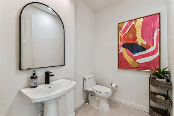 a terrace with outdoor seating and city view