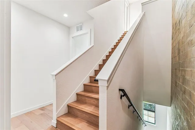 an aerial view of a house with outdoor space