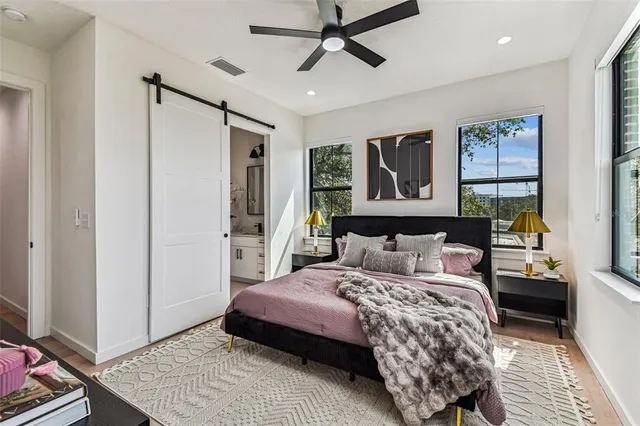 an aerial view of a house with outdoor space garden and mountain view in back