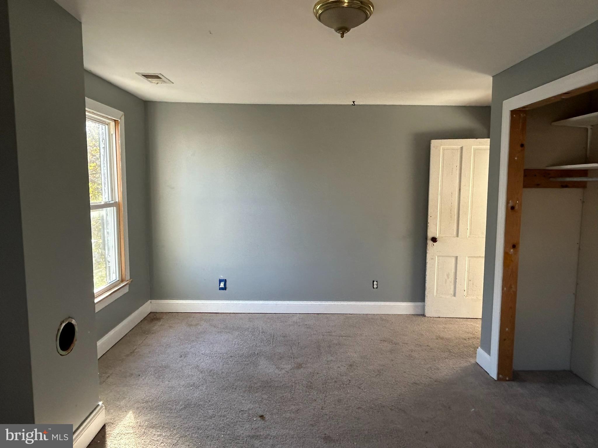 13508 Main Street Queen Anne, MD 21657 - Photo 18 of 22 a view of an empty room with a window