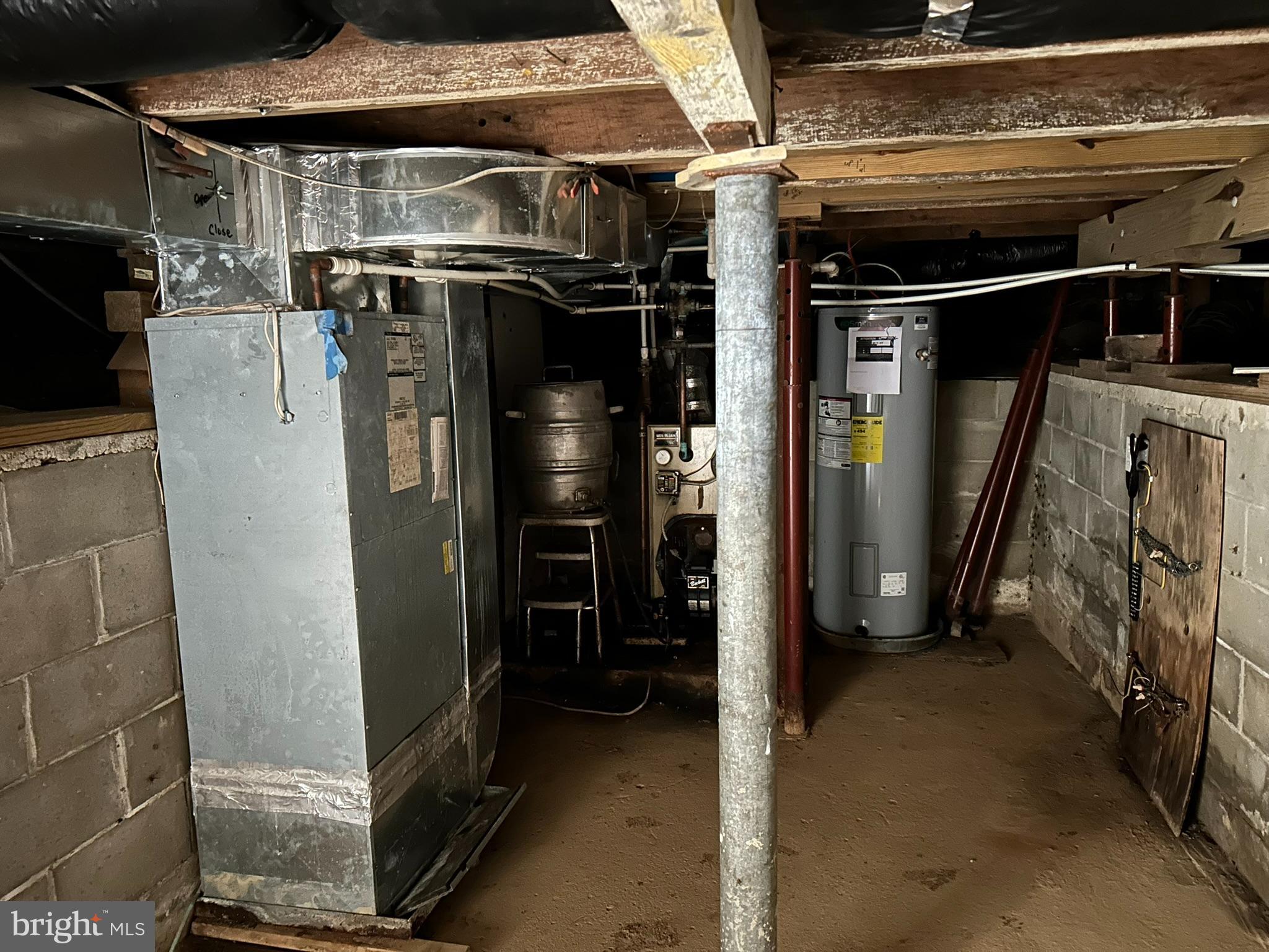 13508 Main Street Queen Anne, MD 21657 - Photo 19 of 22 a view of water heater room