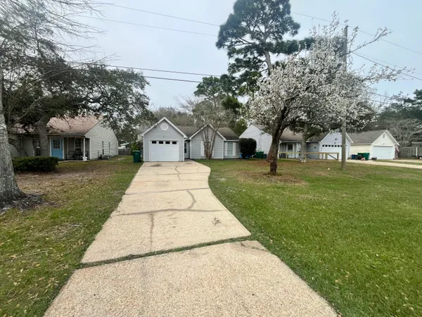 a view of a backyard with garden