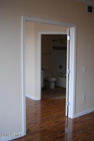1701 East Colter Street, Unit 333 Phoenix, AZ 85016 - Photo 13 of 36 a view of a room that has a bed in it