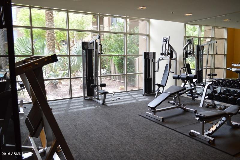1701 East Colter Street, Unit 333 Phoenix, AZ 85016 - Photo 19 of 36 a view of a room with gym equipment