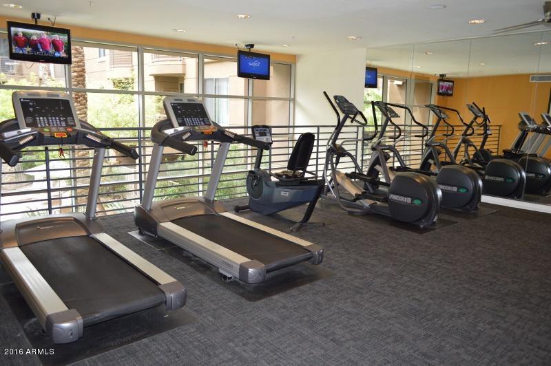 1701 East Colter Street, Unit 333 Phoenix, AZ 85016 - Photo 21 of 36 a room with gym equipment equipment and large window