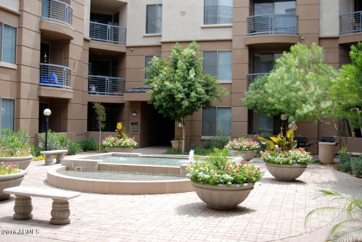 1701 East Colter Street, Unit 333 Phoenix, AZ 85016 - Photo 30 of 36 a view of a house with outdoor space and plants