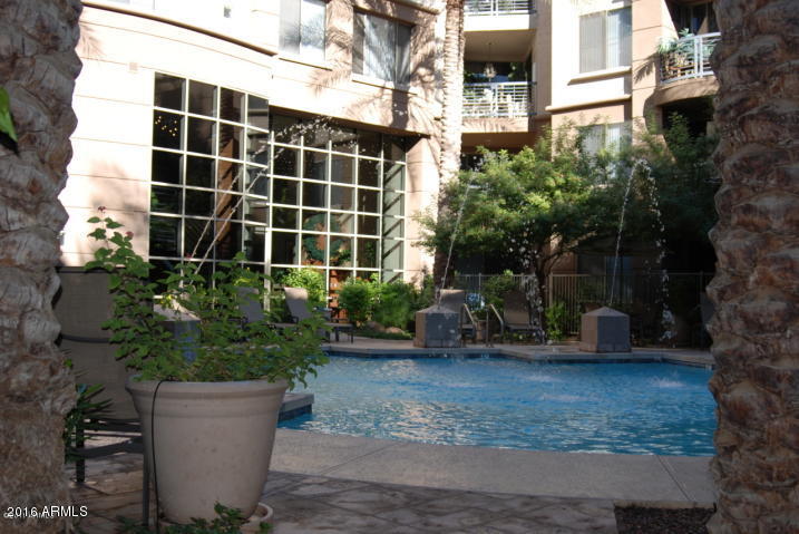 1701 East Colter Street, Unit 333 Phoenix, AZ 85016 - Photo 32 of 36 a view of a house with a yard and plants
