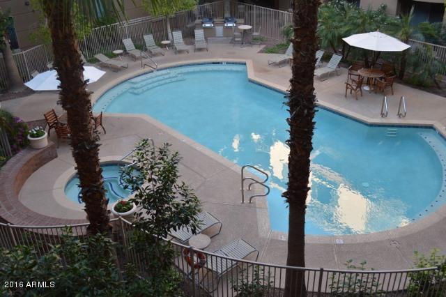 1701 East Colter Street, Unit 333 Phoenix, AZ 85016 - Photo 34 of 36 a view of a balcony with chairs