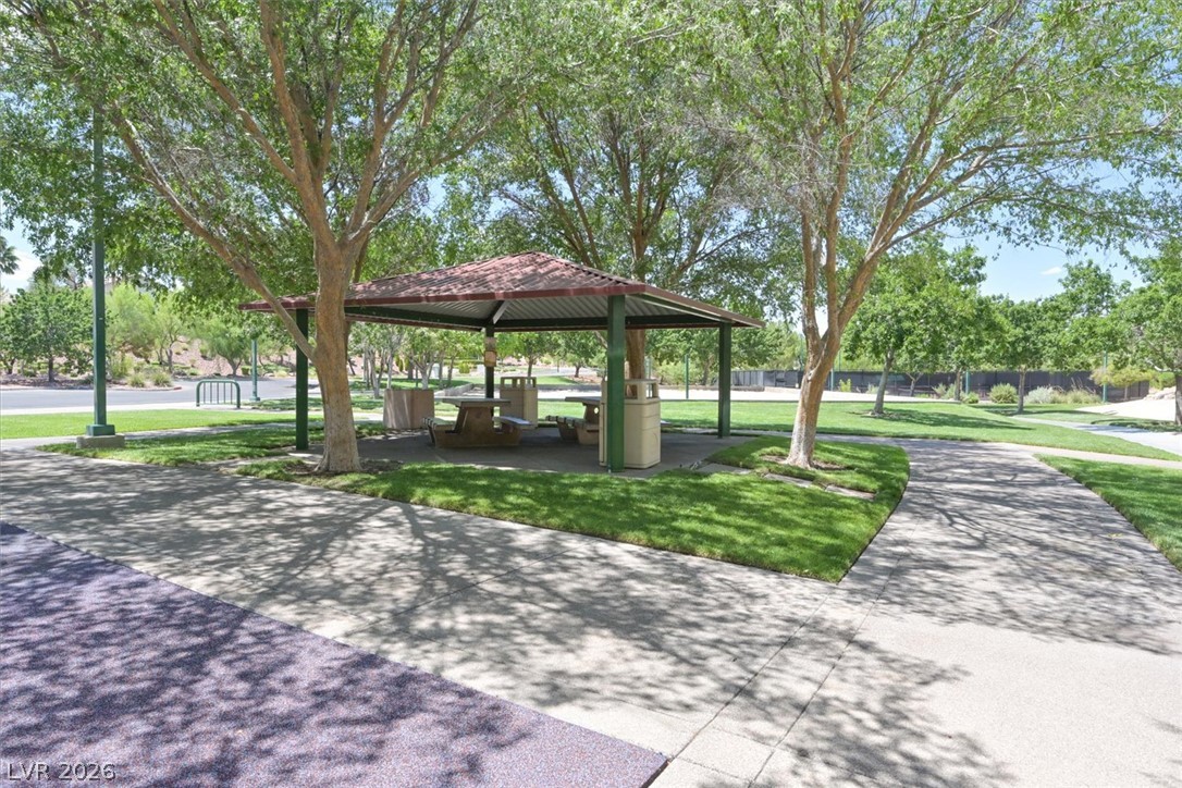 1259 Moon Vision Street Henderson, NV 89052 - Photo 53 of 53 A tranquil park scene with a covered picnic area, ideal for community gatherings.