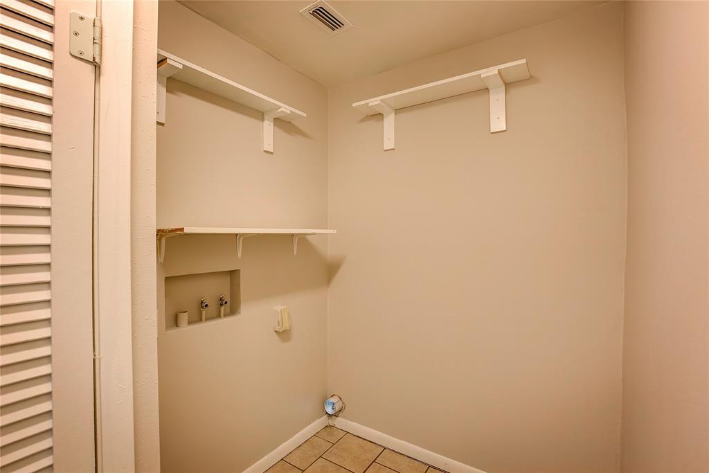 620 Harrison Lane Hurst, TX 76053 - Photo 14 of 32 a bathroom with a shower