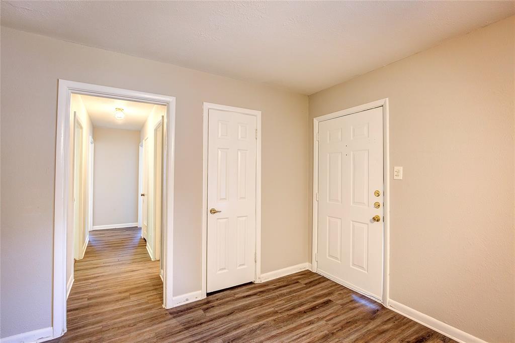620 Harrison Lane Hurst, TX 76053 - Photo 5 of 32 a view of a room with wooden floor