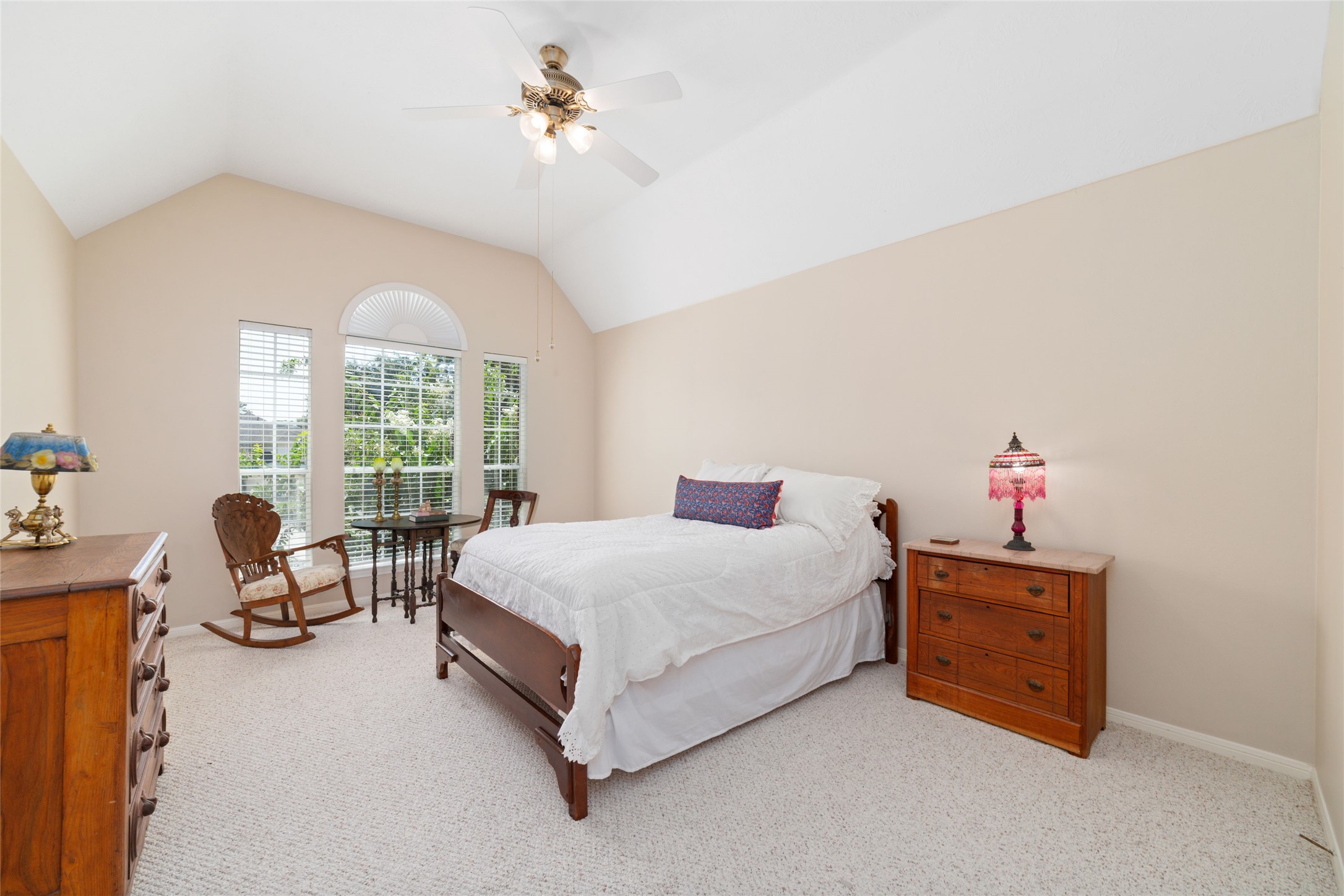 20423 Forest Drive Spring, TX 77388 - Photo 34 of 44 Spacious upstairs bedroom featuring a large layout, ceiling fan, and a generous walk-in closet. This room also has direct access to a private bathroom. This room can easily accommodate a queen or king sized bed making it ideal as an additional primary suite located upstairs.