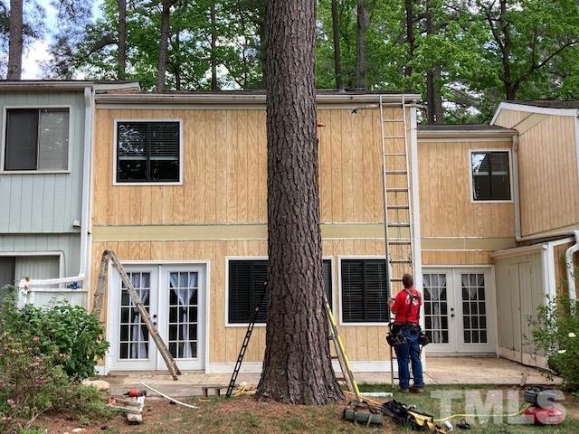 726 Godwin Court Raleigh, NC 27606 - Photo 2 of 23 a view of a building with a door and a large window