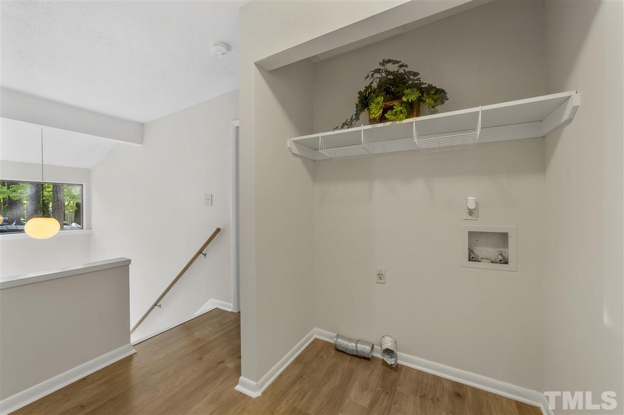 726 Godwin Court Raleigh, NC 27606 - Photo 20 of 23 a view of entryway with wooden floor