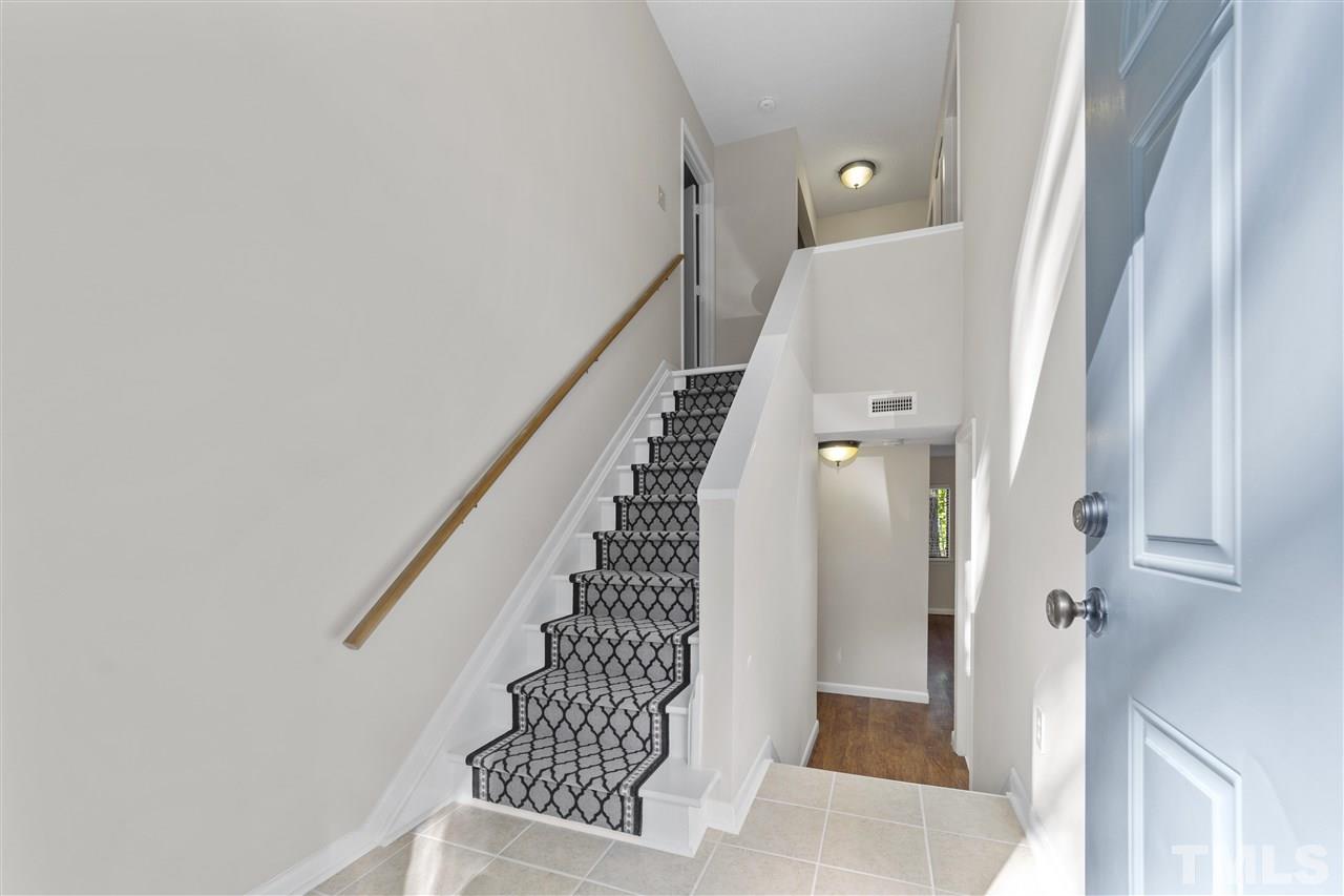 726 Godwin Court Raleigh, NC 27606 - Photo 5 of 23 a view of entryway with furniture and wooden floor