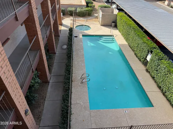 a view of balcony with furniture