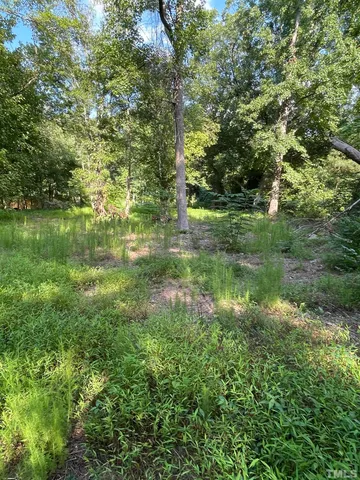 a bathroom with a shower and a shower