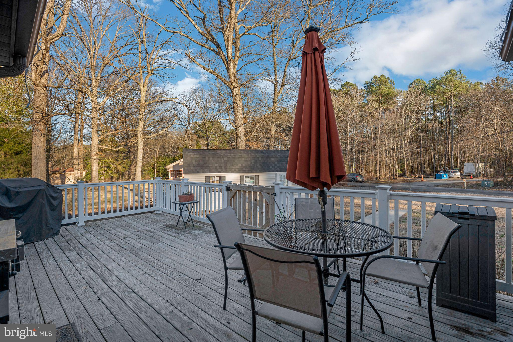 48550 Havirland Road Lexington Park, MD 20653 - Photo 24 of 36 a view of a chairs and table on the deck