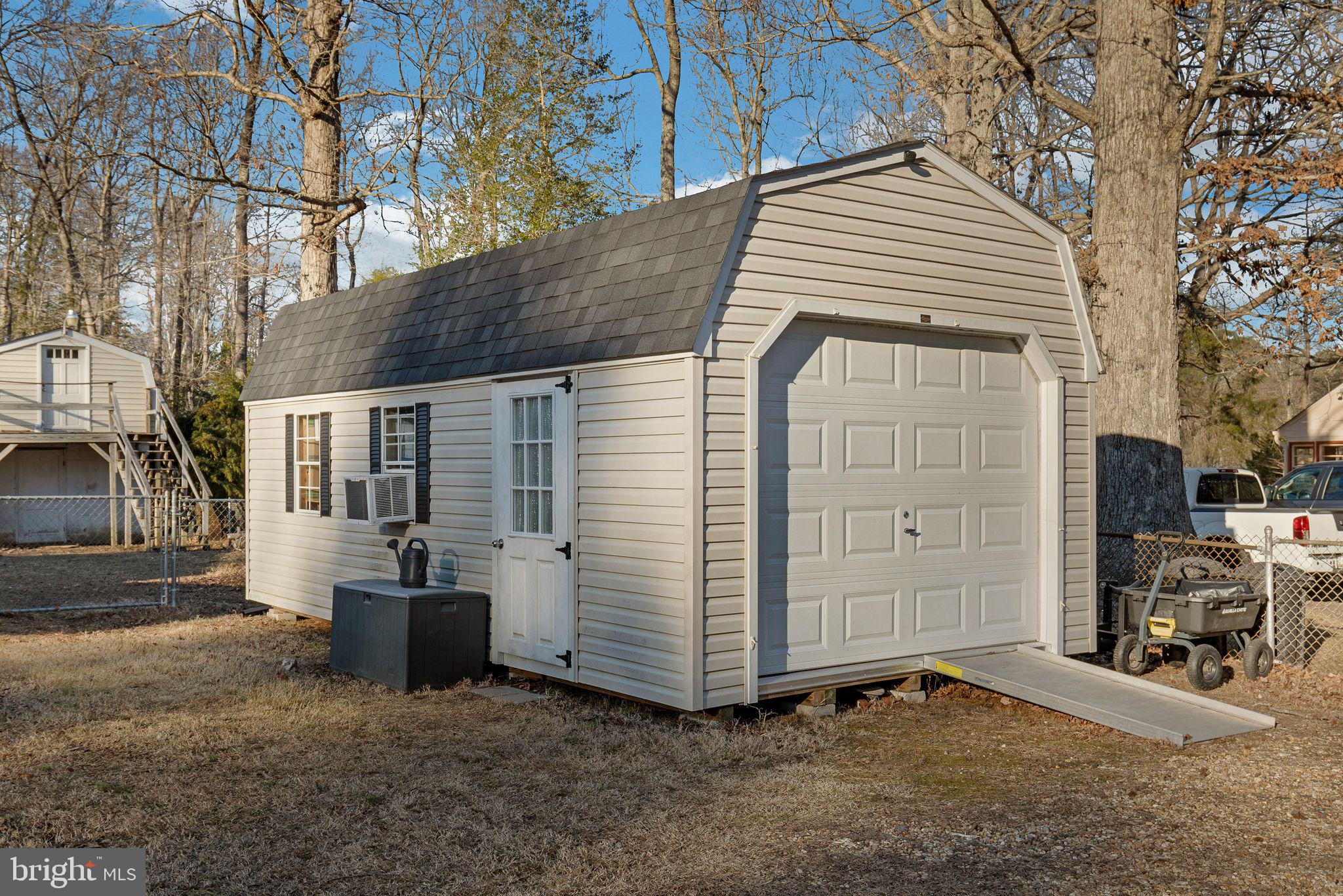 48550 Havirland Road Lexington Park, MD 20653 - Photo 30 of 36 a view of a house with a yard